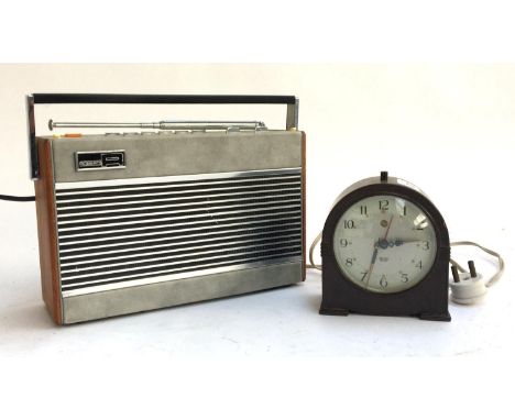 A Robert's Radio AM/FM 3 band mains battery preset radio RP26-B; together with a Smith's Sectric bakelite mantel clock (af), 