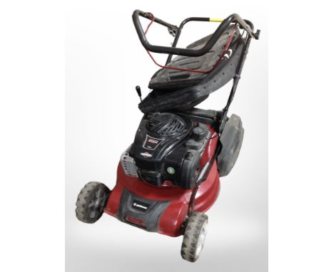A Garden Care petrol lawn mower with Briggs & Stratton engine.