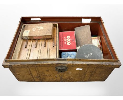 An antique tin trunk containing vintage tins, Oxo cubes, etc., and old collar box, a wooden four-drawer chest, cigar boxes, v