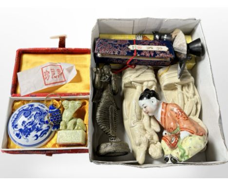 A group of Middle Eastern and oriental collectibles including a Tibetan brass temple figure, other statues, Chinese fan, Chin