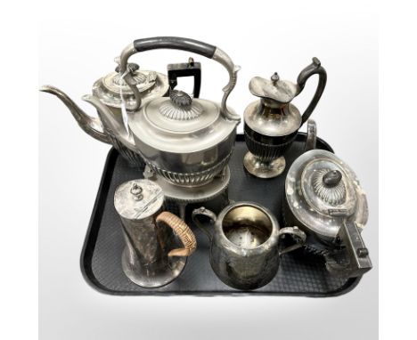 A group of antique and later silver-plated items including spirit kettle on stand, teapot, hot water jug, etc.
