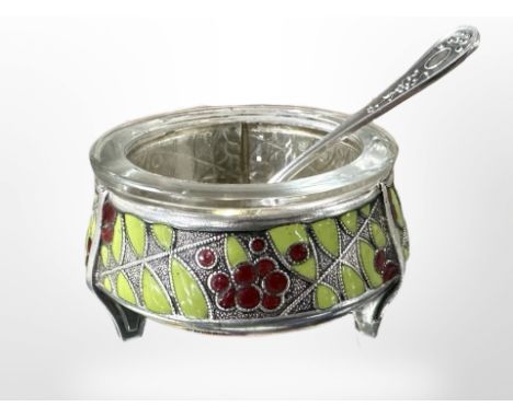 A Russian white metal salt and spoon, with cloisonné enamel decoration.