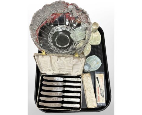 A heavy cut-crystal fruit bowl, together with a set of six mother of pearl effect butter knives, Beswick ash trays, cutlery, 