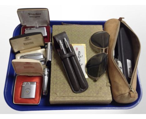 A group of lighters including Ronson and Zippo, together with a pair of sunglasses, Parker pens, Chinese calligraphy set in f