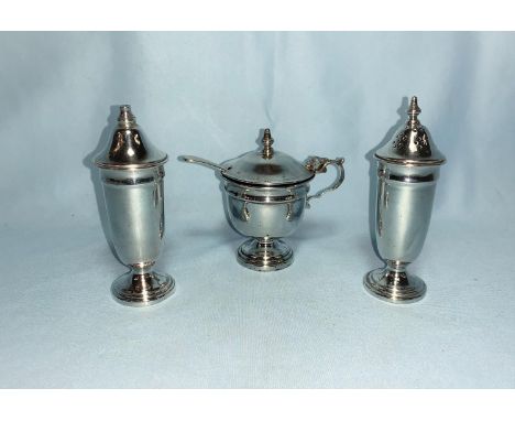 An Art Deco style silver cruet set, 2.7 oz; a cake slice and sauce ladle, 2.5 oz; a knife 