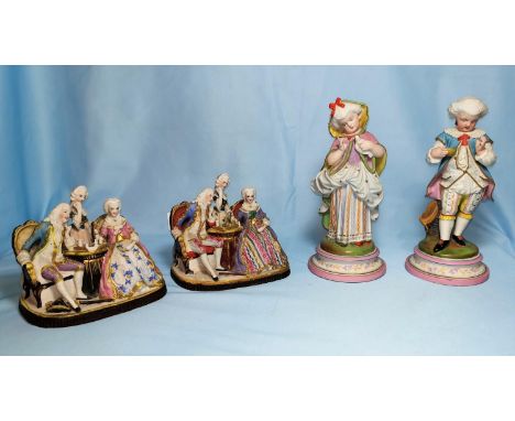 A pair of continental colour bisque figures of a boy and girl, 20 cm; 2 similar figure groups of chess players (both a.f.) 