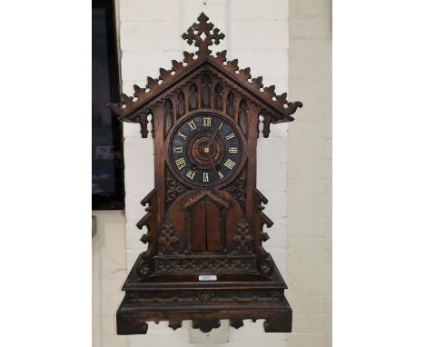 A late 19th century Black Forest mantel clock with Bugle Boy alarm, 65 cm 