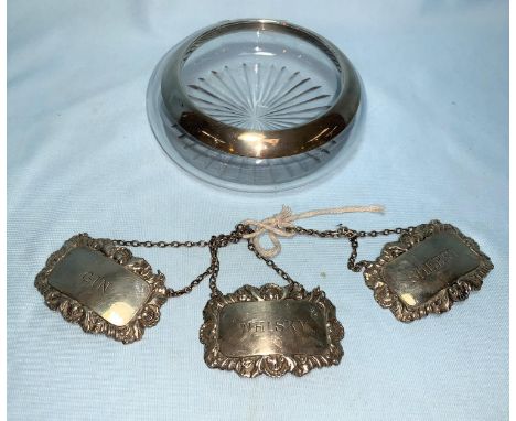 Three silver bottle labels:  whisky, sherry &amp; gin, Birmingham 1967; a silver rim trinket dish 