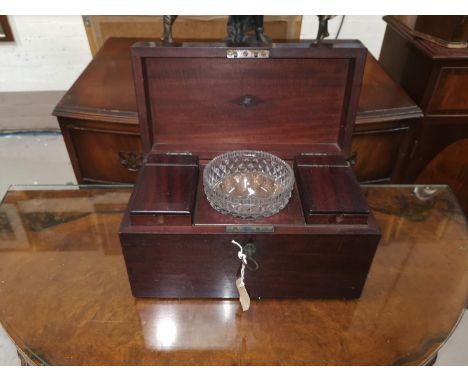 A Georgian mahogany rectangular tea caddy, the interior with 2 compartments and matched cut glass bowl, 28 cm 