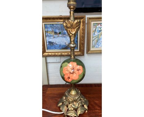 A Moorcroft lamp with cast metal fittings 