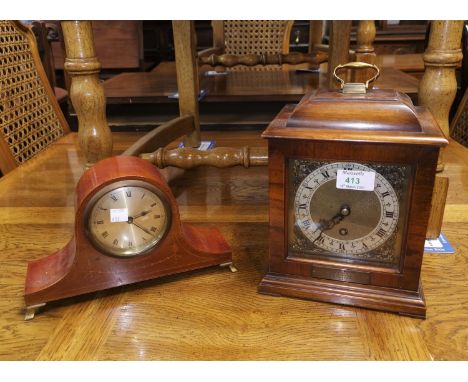 A Georgian style bracket clock in walnut case; an Edwardian mantel clock in inlaid mahogany case 