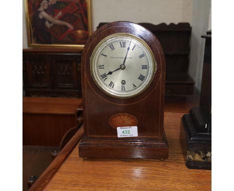 A 1920's mantel clock in mahogany arched case with 8 day movement, Thomas Russell and Son 