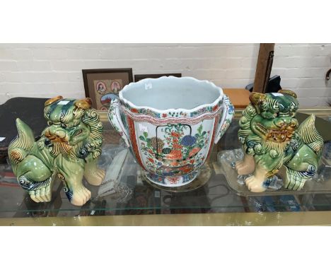 A Chinese double handled ceramic bowl with polychrome decoration of flowers etc with wavy rim ht 21cm diameter 22cm, two temp
