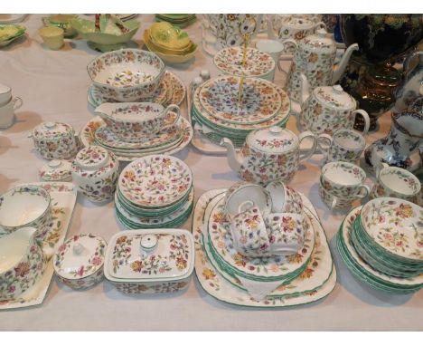 A Minton "Haddon Hall" part dinner service approx 65 pieces including two tea pots and a coffee pot etc 
