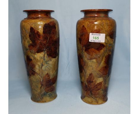 A late 19th century pair of Royal Doulton tapering vases decorated with autumn leaves, impressed mark, height 26 cm; a horn h
