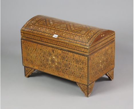 An eastern-style inlaid wooden dome-top trunk with a hinged lift-lid, &amp; on bracket feet, 57.25cm wide x 42cm high.