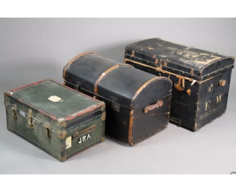 Two fibre-covered domed-top travelling trunks, both 83.5cm wide; &amp; another travelling trunk, 73cm wide