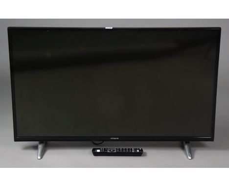 A Hitachi 43” television with remote control.