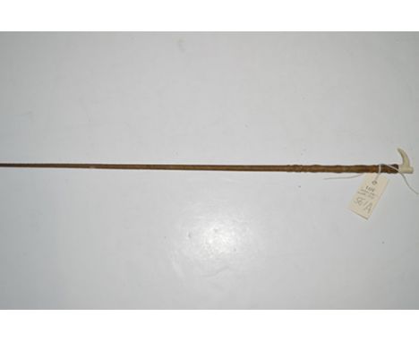 A lady's side-saddle whip with ivory handle and rope-bound stem.