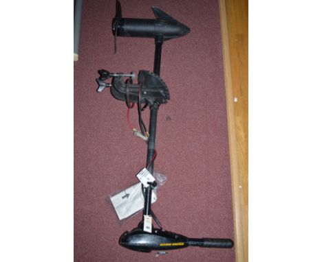 A Minnkota electric outboard motor, with instruction manual and mounting bracket (no battery).