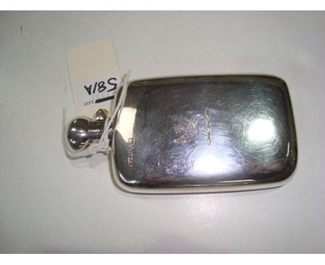 A silver hip flask, by Thomas Hayes, Birmingham 1893, engraved with dragon pattern crest.