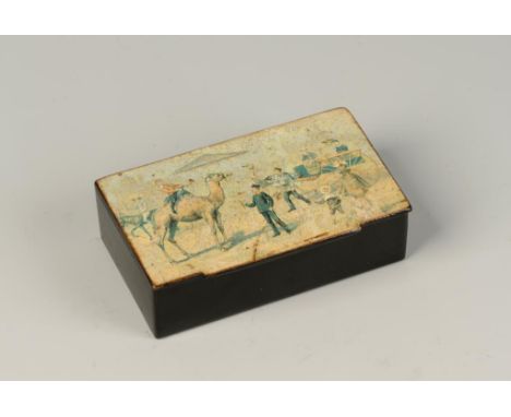 A VICTORIAN PAPIER MACHE SNUFF BOX, the hinged lid with transfer printed scene of a boy riding a camel with  onlookers riding
