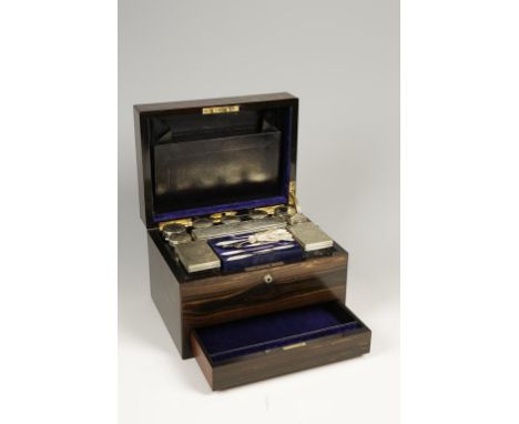 A VICTORIAN COROMANDEL AND GILT BRASS MOUNTED TRAVELLING CASE, the rectangular case containing an assortment of glass jars wi
