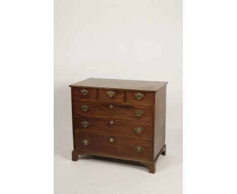 A LATE GEORGE III MAHOGANY CHEST OF DRAWERS, the rectangular top above three small drawers and three long graduated drawers w