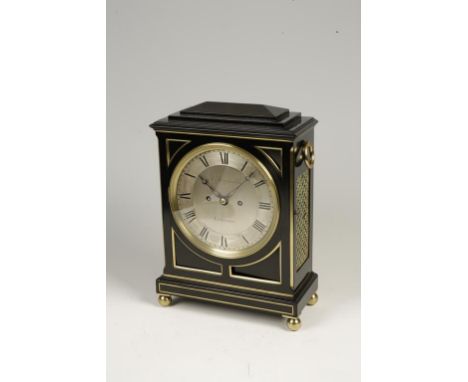 T. REYNOLDS, LONDON: A REGENCY EBONIZED BRACKET CLOCK, twin fusee and striking on a bell, the ebonized case with gilt grilles