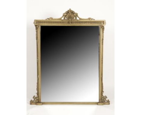 A LOUIS XVI STYLE GILT FRAMED WALL MIRROR, the rectangular plate within a foliate and scroll-cast surround, 53" high x 45" wi