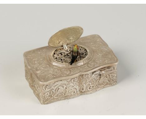 A GERMAN SILVER BIRD AUTOMATON MUSICAL BOX, in the manner of Karl Griersbaum, decorated with scrolls and birds overall, the s