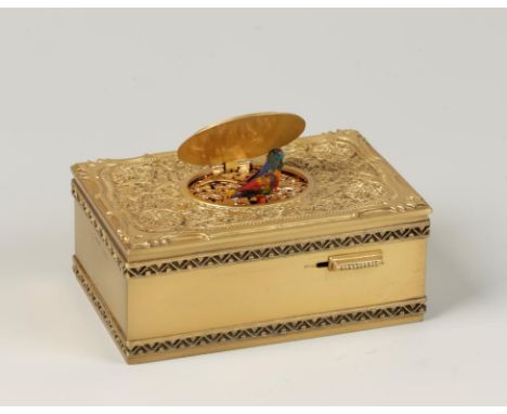 A GERMAN SILVER GILT BIRD AUTOMATON MUSICAL BOX, the box with moulded and wirework scroll and rosette decoration to the lid, 