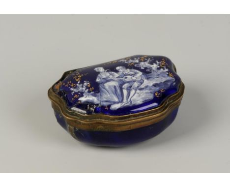 A STAFFORDSHIRE ENAMEL PATCH BOX, of cartouche form, enamelled in white with courting figures against a royal blue ground, th