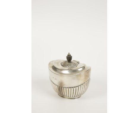 AN EDWARDIAN TEA CADDY of oval form with part-fluted decoration, by William Hutton & Sons Ltd, London 1903, 4.75" high (c.6.5