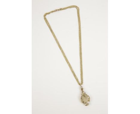 AN UNMARKED YELLOW GOLD LOCKET PENDANT, of cartouche form, with engine turned and engraved floral decoration, the double hing