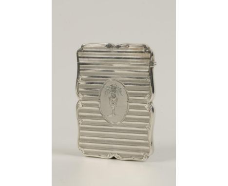 A VICTORIAN CARD CASE of shaped rectangular form with engine-turned decoration, one side monogrammed, the other engraved with