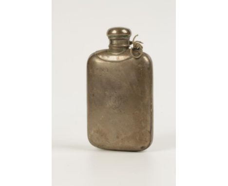 AN EDWARDIAN SPIRIT FLASK of shaped rectangular form, crested, by Sampson Mordan & Co., London assay, date letter rubbed, cir