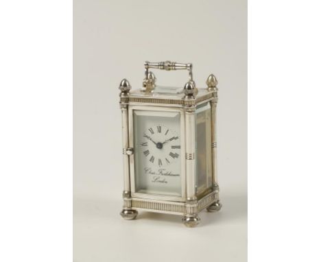 CHARLES FRODSHAM, LONDON: A MODERN SILVER CASED MINIATURE CARRIAGE CLOCK, 4" high. See illustration.