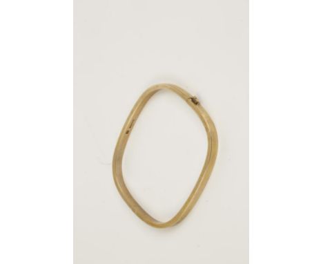 A 9CT GOLD HINGED BANGLE, of square form, hallmarked, c. 22.8g. 