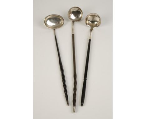 A TODDY LADLE with whalebone handle, possibly marked for Perth, makers mark struck twice but only partially visible, possibly