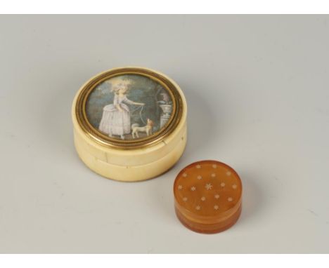 A REGENCY IVORY SNUFF BOX, of circular form, inset to the lid with a painted miniature of an 18th century woman walking her s