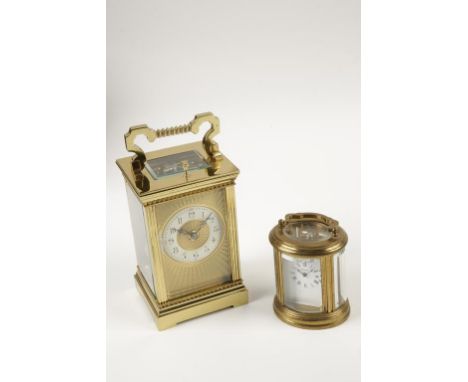 A FRENCH BRASS CASE REPEATING CARRIAGE CLOCK, the cream enamel chapter ring with Arabic numerals, with an engine-turned gilt 