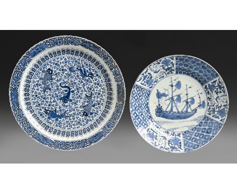 Two Chinese blue and white dishes, Kangxi, the smaller painted with a ship in panelled border with boys and lotus alternating