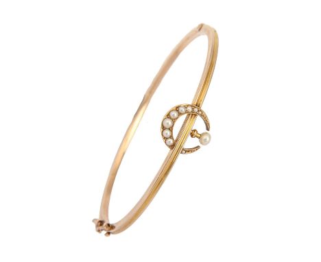 A Victorian gold bangle, with crescent of seed pearls, 58mm (internal), 7.5g, morocco case  Good condition