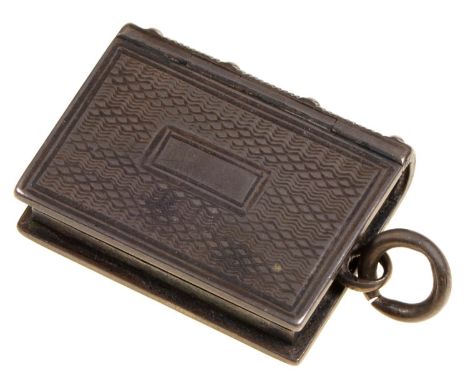 A Victorian silver vinaigrette in the form of a book, engine turned, foliate grille, 26mm l, by Taylor &amp; Perry, Birmingha