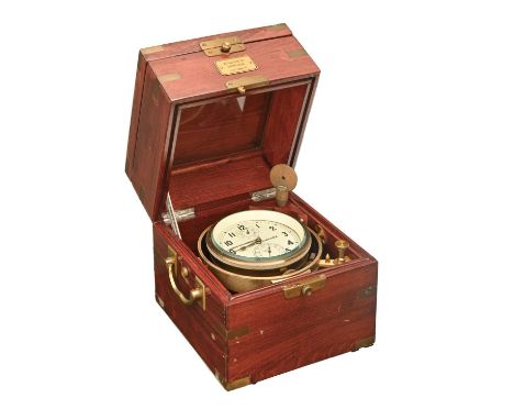 A Soviet two day marine chronometer,&nbsp;&nbsp;the 10.5cm painted dial signed in Cyrillic and No 493 in red, with brass and 