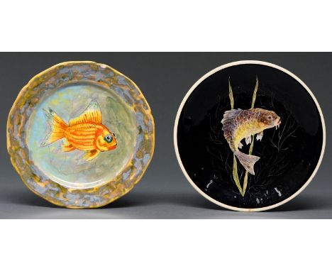 Two Quimper faience plates, 20th c, painted by P Lamic or Guy Trevoux, both signed, with a fish, 21cm diam, painted signature