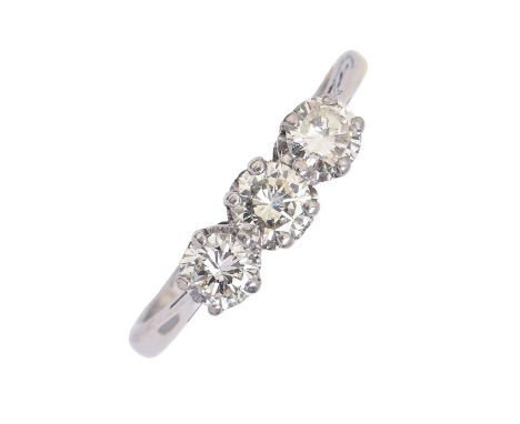 A diamond ring, with three round brilliant cut diamonds, in white gold marked 18, 3.4g, size O  Light wear