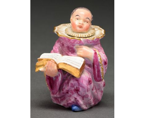 A Meissen figural inkwell and stopper in the form of a choir boy, 19th c, in puce robe, 84mm h, underglaze blue crossed sword