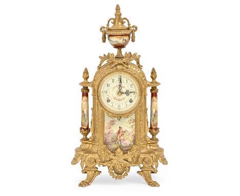 A decorative cast brass mantel clock, late 20th c, in Louis XV style, with painted earthenware urn, pillars and plaque, strik